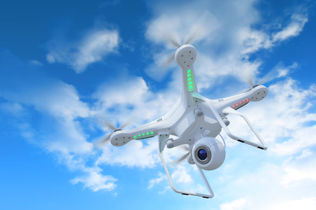 White quadcopter drone with camera flying against a blue sky with scattered clouds.