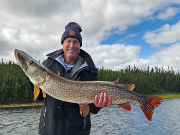 Man holding large fish 1