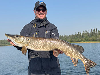 Man holding large fish 3