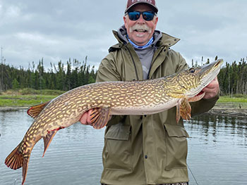 Man holding large fish 7