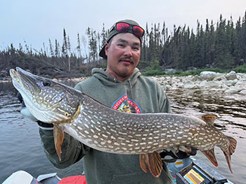 Man holding large fish 8