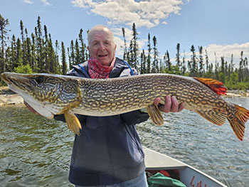 Man holding large fish 6