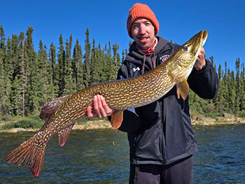 Man holding large fish 8
